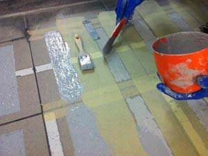 Application of Belzona 5231 with additional aggregate incorporated onto fish market floor Application of Belzona 5231 with additional aggregate incorporated onto fish market floor